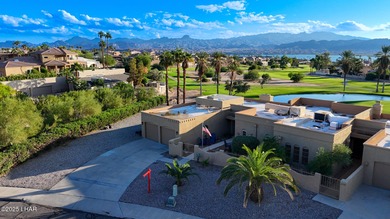 Discover luxury living with stunning mountain, lake, pond, and on London Bridge Golf Course in Arizona - for sale on GolfHomes.com, golf home, golf lot