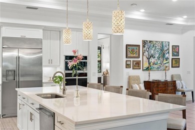 Coastal first-floor end unit with no neighboring building next on Windstar on Naples Bay in Florida - for sale on GolfHomes.com, golf home, golf lot