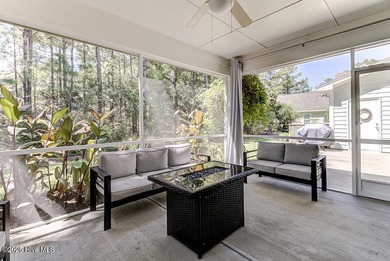 Beautifully updated townhouse tucked away in a peaceful on Cape Fear National At Brunswick Forest in North Carolina - for sale on GolfHomes.com, golf home, golf lot