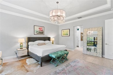 Coastal first-floor end unit with no neighboring building next on Windstar on Naples Bay in Florida - for sale on GolfHomes.com, golf home, golf lot