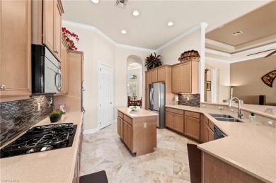 This sought-after Aragon model sits on a premium lakefront lot on Estero Country Club in Florida - for sale on GolfHomes.com, golf home, golf lot