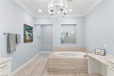 Coastal first-floor end unit with no neighboring building next on Windstar on Naples Bay in Florida - for sale on GolfHomes.com, golf home, golf lot