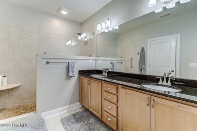 Beautifully updated townhouse tucked away in a peaceful on Cape Fear National At Brunswick Forest in North Carolina - for sale on GolfHomes.com, golf home, golf lot