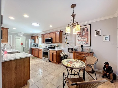 Under contract-accepting backup offers. Welcome to this on Arlington Ridge Golf Club in Florida - for sale on GolfHomes.com, golf home, golf lot