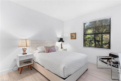 Coastal first-floor end unit with no neighboring building next on Windstar on Naples Bay in Florida - for sale on GolfHomes.com, golf home, golf lot