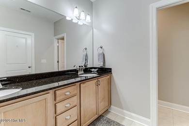 Beautifully updated townhouse tucked away in a peaceful on Cape Fear National At Brunswick Forest in North Carolina - for sale on GolfHomes.com, golf home, golf lot