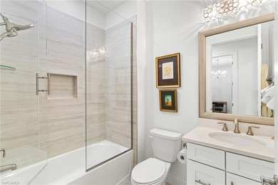 Coastal first-floor end unit with no neighboring building next on Windstar on Naples Bay in Florida - for sale on GolfHomes.com, golf home, golf lot