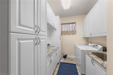 This sought-after Aragon model sits on a premium lakefront lot on Estero Country Club in Florida - for sale on GolfHomes.com, golf home, golf lot