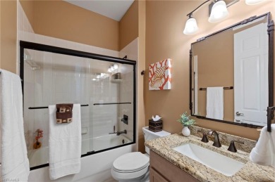 This sought-after Aragon model sits on a premium lakefront lot on Estero Country Club in Florida - for sale on GolfHomes.com, golf home, golf lot