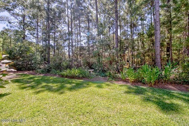 Beautifully updated townhouse tucked away in a peaceful on Cape Fear National At Brunswick Forest in North Carolina - for sale on GolfHomes.com, golf home, golf lot