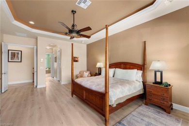 This sought-after Aragon model sits on a premium lakefront lot on Estero Country Club in Florida - for sale on GolfHomes.com, golf home, golf lot