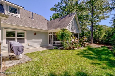 Beautifully updated townhouse tucked away in a peaceful on Cape Fear National At Brunswick Forest in North Carolina - for sale on GolfHomes.com, golf home, golf lot