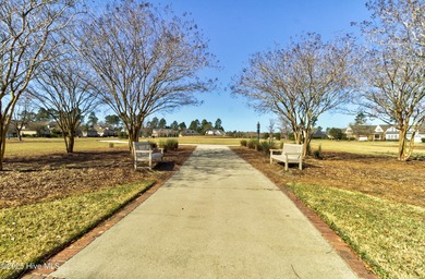 Beautifully updated townhouse tucked away in a peaceful on Cape Fear National At Brunswick Forest in North Carolina - for sale on GolfHomes.com, golf home, golf lot