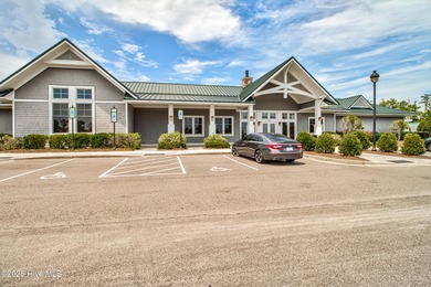 Beautifully updated townhouse tucked away in a peaceful on Cape Fear National At Brunswick Forest in North Carolina - for sale on GolfHomes.com, golf home, golf lot