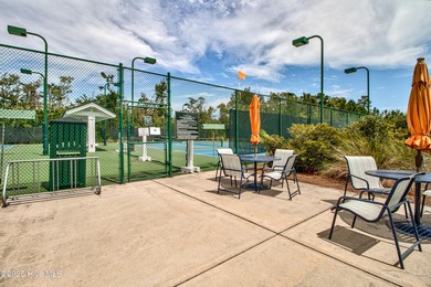Beautifully updated townhouse tucked away in a peaceful on Cape Fear National At Brunswick Forest in North Carolina - for sale on GolfHomes.com, golf home, golf lot