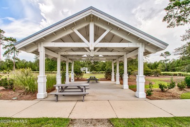 Beautifully updated townhouse tucked away in a peaceful on Cape Fear National At Brunswick Forest in North Carolina - for sale on GolfHomes.com, golf home, golf lot