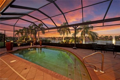This sought-after Aragon model sits on a premium lakefront lot on Estero Country Club in Florida - for sale on GolfHomes.com, golf home, golf lot