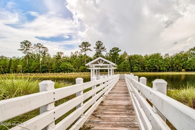 Beautifully updated townhouse tucked away in a peaceful on Cape Fear National At Brunswick Forest in North Carolina - for sale on GolfHomes.com, golf home, golf lot