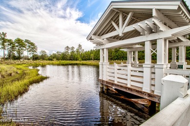 Beautifully updated townhouse tucked away in a peaceful on Cape Fear National At Brunswick Forest in North Carolina - for sale on GolfHomes.com, golf home, golf lot