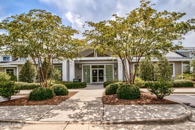 Beautifully updated townhouse tucked away in a peaceful on Cape Fear National At Brunswick Forest in North Carolina - for sale on GolfHomes.com, golf home, golf lot