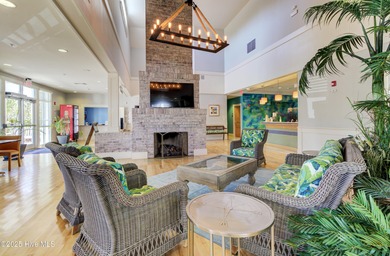 Beautifully updated townhouse tucked away in a peaceful on Cape Fear National At Brunswick Forest in North Carolina - for sale on GolfHomes.com, golf home, golf lot