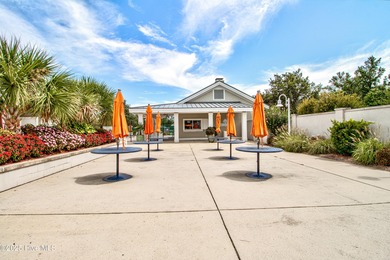 Beautifully updated townhouse tucked away in a peaceful on Cape Fear National At Brunswick Forest in North Carolina - for sale on GolfHomes.com, golf home, golf lot