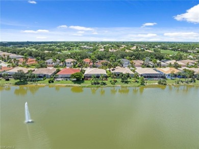 This sought-after Aragon model sits on a premium lakefront lot on Estero Country Club in Florida - for sale on GolfHomes.com, golf home, golf lot