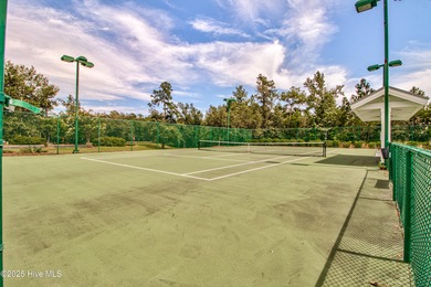 Beautifully updated townhouse tucked away in a peaceful on Cape Fear National At Brunswick Forest in North Carolina - for sale on GolfHomes.com, golf home, golf lot