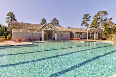 Beautifully updated townhouse tucked away in a peaceful on Cape Fear National At Brunswick Forest in North Carolina - for sale on GolfHomes.com, golf home, golf lot