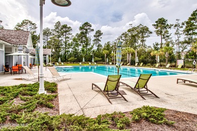 Beautifully updated townhouse tucked away in a peaceful on Cape Fear National At Brunswick Forest in North Carolina - for sale on GolfHomes.com, golf home, golf lot