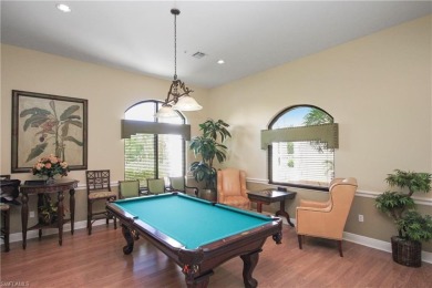 This sought-after Aragon model sits on a premium lakefront lot on Estero Country Club in Florida - for sale on GolfHomes.com, golf home, golf lot