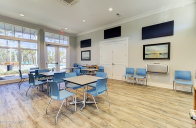 Beautifully updated townhouse tucked away in a peaceful on Cape Fear National At Brunswick Forest in North Carolina - for sale on GolfHomes.com, golf home, golf lot