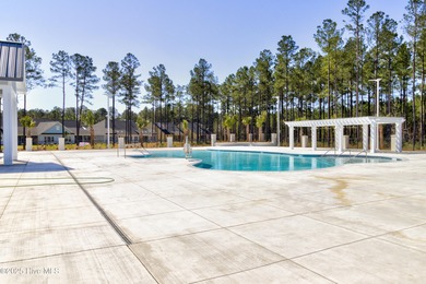 Beautifully updated townhouse tucked away in a peaceful on Cape Fear National At Brunswick Forest in North Carolina - for sale on GolfHomes.com, golf home, golf lot