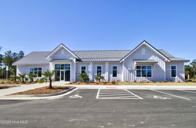 Beautifully updated townhouse tucked away in a peaceful on Cape Fear National At Brunswick Forest in North Carolina - for sale on GolfHomes.com, golf home, golf lot