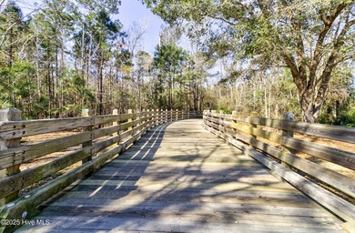 Beautifully updated townhouse tucked away in a peaceful on Cape Fear National At Brunswick Forest in North Carolina - for sale on GolfHomes.com, golf home, golf lot