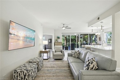 Stunning, completely remodeled end-unit first-floor coach home on West Bay Beach and Golf Club in Florida - for sale on GolfHomes.com, golf home, golf lot
