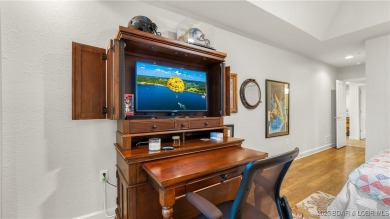 Experience lakefront luxury in the prestigious, gated community on The Club At Old Kinderhook in Missouri - for sale on GolfHomes.com, golf home, golf lot