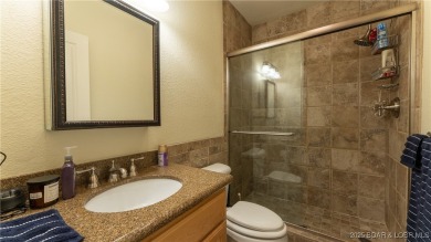 Experience lakefront luxury in the prestigious, gated community on The Club At Old Kinderhook in Missouri - for sale on GolfHomes.com, golf home, golf lot