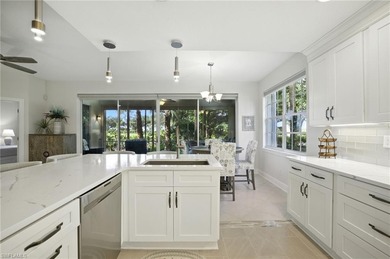 Stunning, completely remodeled end-unit first-floor coach home on West Bay Beach and Golf Club in Florida - for sale on GolfHomes.com, golf home, golf lot