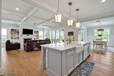 Welcome to 5083 Creswell Drive, a true gem located in the highly on Cape Fear National At Brunswick Forest in North Carolina - for sale on GolfHomes.com, golf home, golf lot