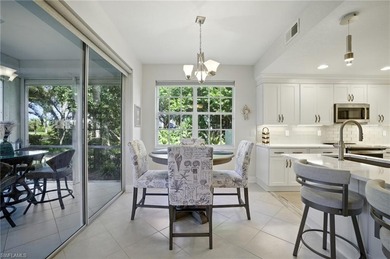 Stunning, completely remodeled end-unit first-floor coach home on West Bay Beach and Golf Club in Florida - for sale on GolfHomes.com, golf home, golf lot