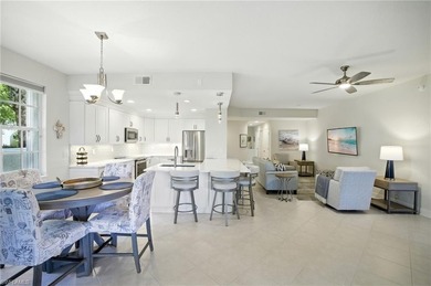 Stunning, completely remodeled end-unit first-floor coach home on West Bay Beach and Golf Club in Florida - for sale on GolfHomes.com, golf home, golf lot