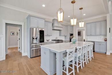 Welcome to 5083 Creswell Drive, a true gem located in the highly on Cape Fear National At Brunswick Forest in North Carolina - for sale on GolfHomes.com, golf home, golf lot