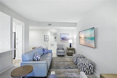 Stunning, completely remodeled end-unit first-floor coach home on West Bay Beach and Golf Club in Florida - for sale on GolfHomes.com, golf home, golf lot