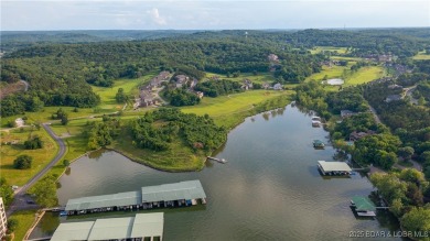 Experience lakefront luxury in the prestigious, gated community on The Club At Old Kinderhook in Missouri - for sale on GolfHomes.com, golf home, golf lot
