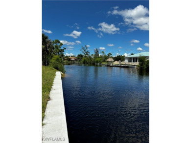 Motivated seller!!  This beautiful waterfront lot in NW Cape on Burnt Store Golf Club in Florida - for sale on GolfHomes.com, golf home, golf lot