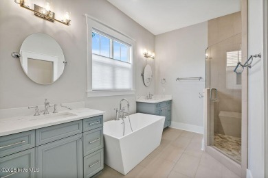 Welcome to 5083 Creswell Drive, a true gem located in the highly on Cape Fear National At Brunswick Forest in North Carolina - for sale on GolfHomes.com, golf home, golf lot