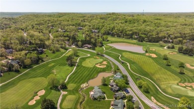 Experience lakefront luxury in the prestigious, gated community on The Club At Old Kinderhook in Missouri - for sale on GolfHomes.com, golf home, golf lot