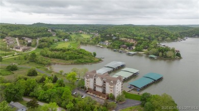 Experience lakefront luxury in the prestigious, gated community on The Club At Old Kinderhook in Missouri - for sale on GolfHomes.com, golf home, golf lot