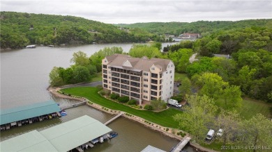 Experience lakefront luxury in the prestigious, gated community on The Club At Old Kinderhook in Missouri - for sale on GolfHomes.com, golf home, golf lot